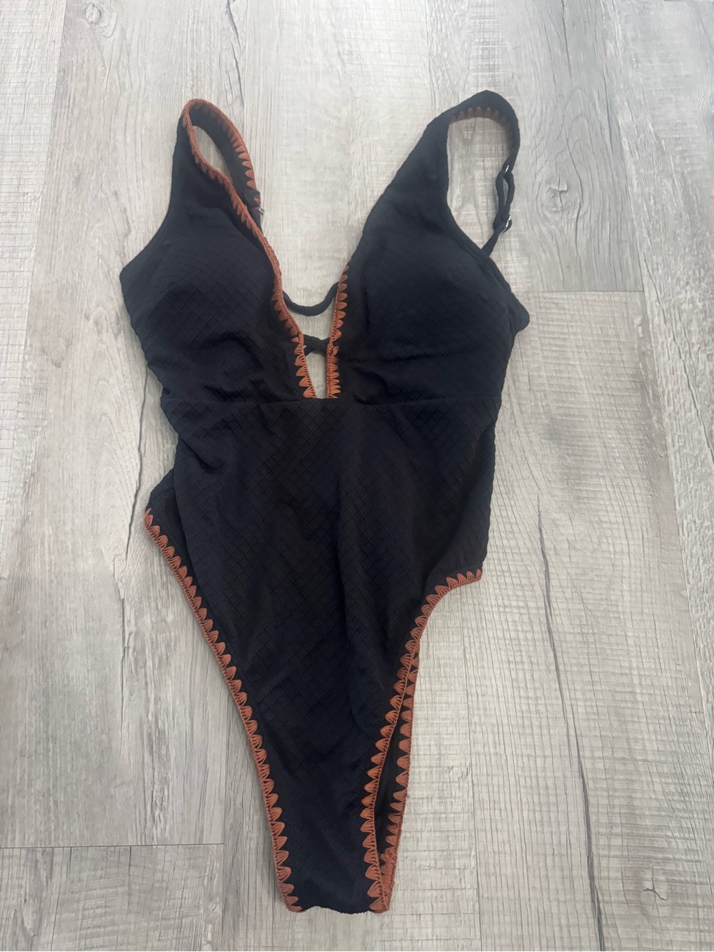 Black One-Piece Swimsuit with Brown Trim